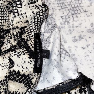 This is a snake skin tight fitting skirt